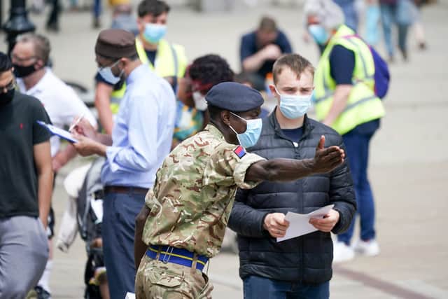 The Government has drafted in more military personnel in an attempt to speed up the Covid booster vaccination programme (image: Getty Images)