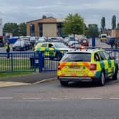 A teenage boy has been arrested after a teacher was stabbed at a secondary school in Tewkesbury, Gloucestershire 