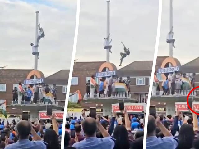 This is the heart-stopping moment an Indian fan plunged 30ft after trying to tie a flag around a pole during wild T20 World Cup celebrations. 
