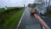 Norman Chai smashes into oncoming traffic as he loses control after overtaking a lorry.