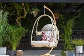 Sydney Rope Folding Egg Chair includes a plush cushion and can be folded to make seasonal storage more convenient