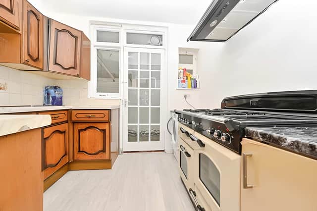 The kitchen forms part of a practical single-storey layout that offers buyers an excellent starting point for future improvements.
