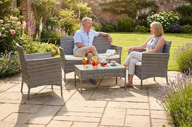 The £67 garden furniture set includes a two-seater sofa, two armchairs and a tempered glass coffee table