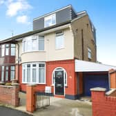 The Grantham Road frontage introduces a heavily extended five-bedroom semi-detached home with substantial off-street parking and a large garage