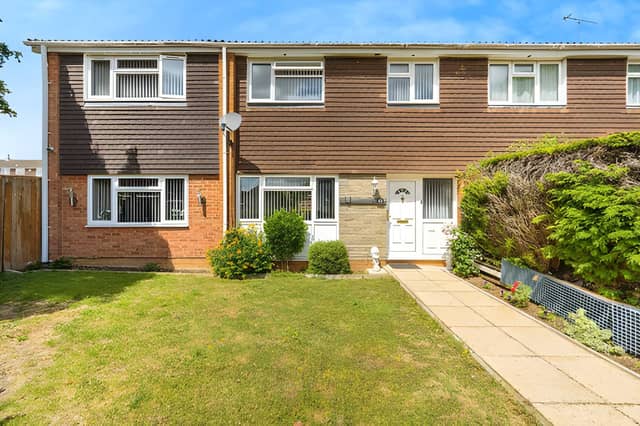 The Verulam Gardens property combines an established front garden with off-street parking and a single garage