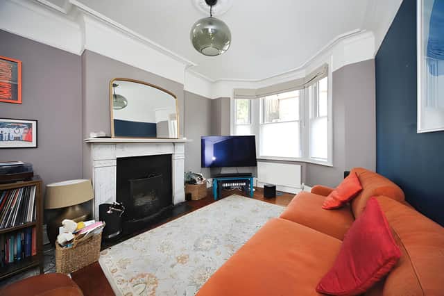 The spacious through lounge and dining area provides a versatile heart to the extended family home