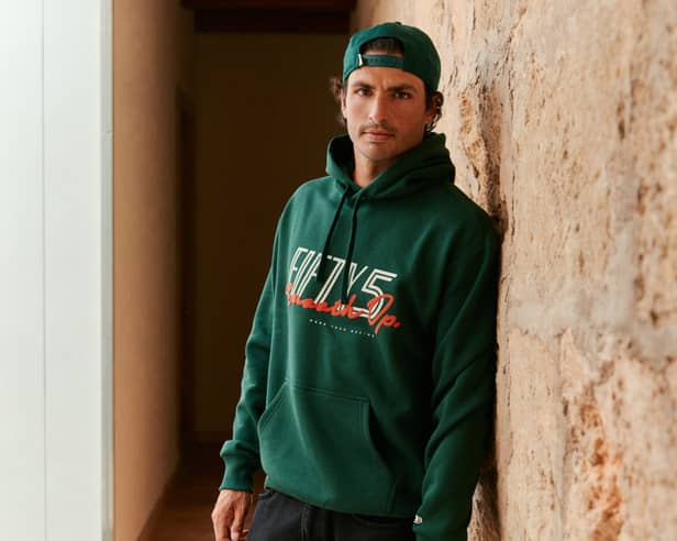Formula 1 star Carlos Sainz is taking his style off the track with a brand-new fashion collaboration with New Era