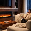 The electric fireplace offers 12 flame colours, five brightness levels and two heat settings
