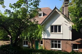 The detached Hart Hill Lane home occupies a large plot with a driveway and double garage