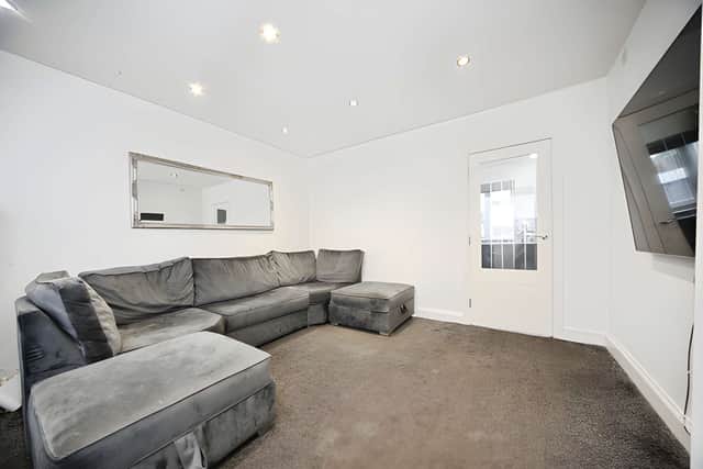 The bright lounge forms the main reception space on the ground floor.