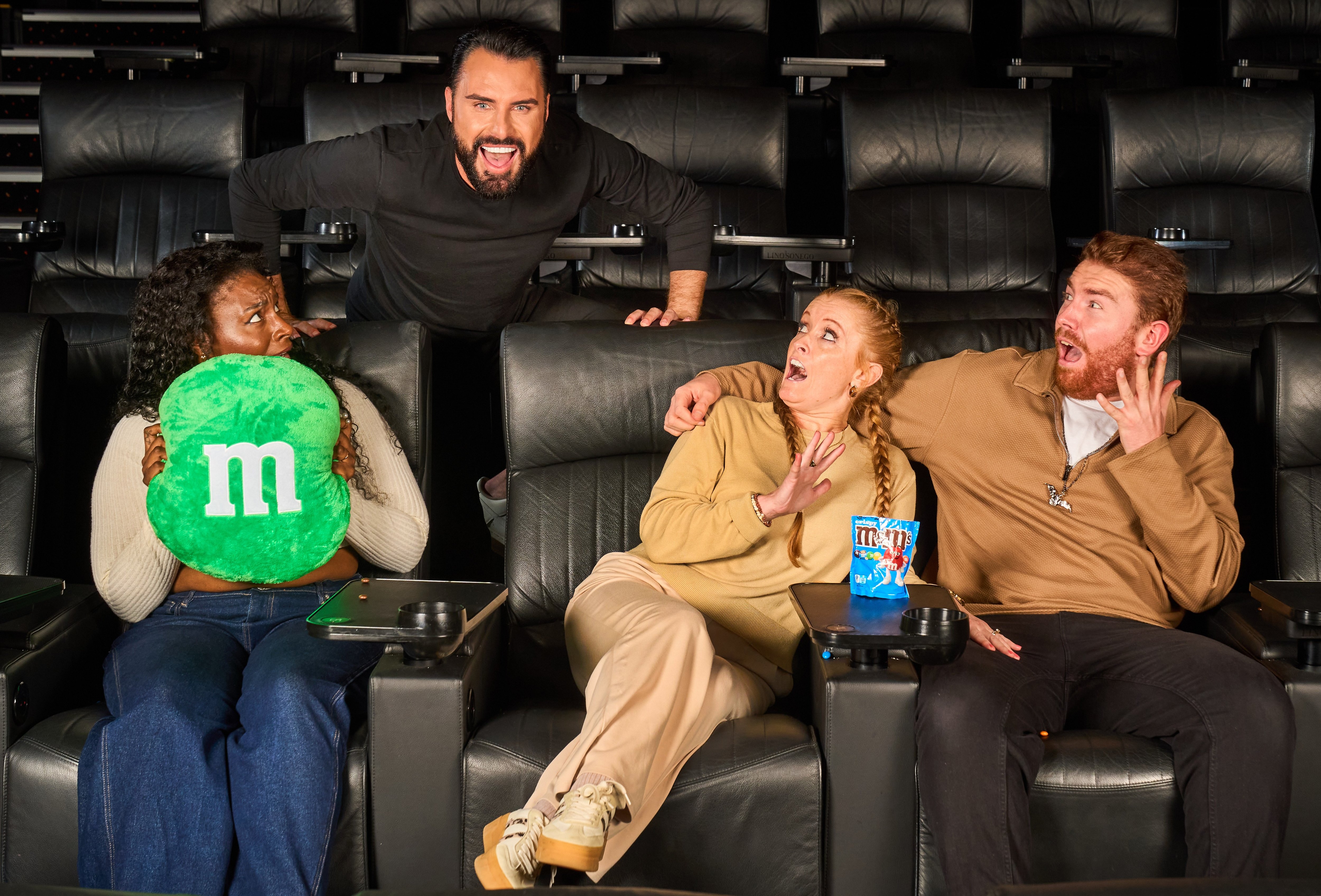Rylan has disguised himself as a sofa to surprise unsuspecting filmgoers