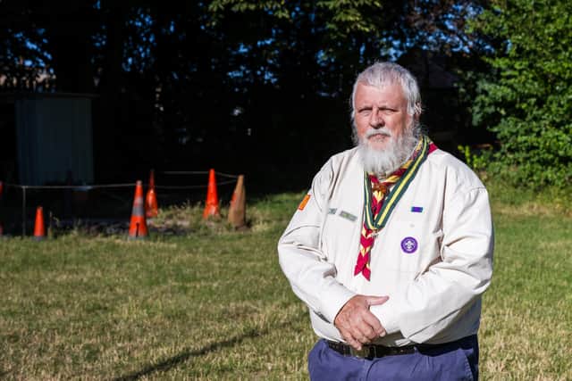 Gerald Law, Chairperson of Falkes District Scouts poses at Ross Park Scout Head Quarters with his award, The Silver Wolf.