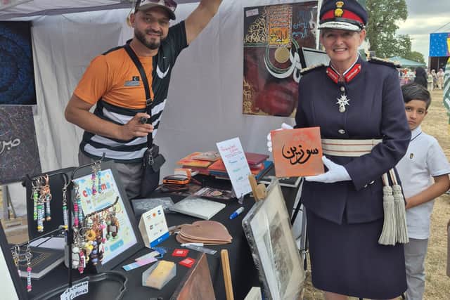 Lord Lieutenant Susan Lousada with local artist Abu Yahya.
