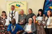 Resident Sally Layton accepted Caddington Grove's award