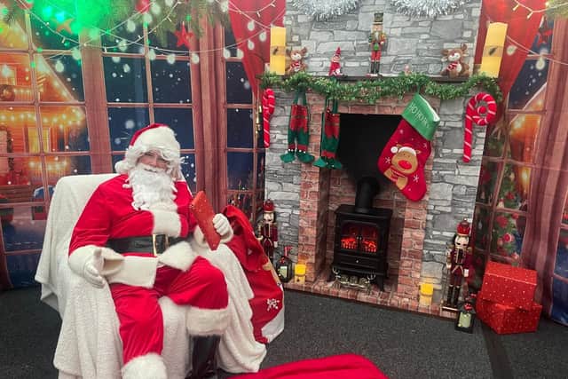 Santa Claus Ready In His North Pole Grotto at Little Bramingham Farm Residential Care Home.