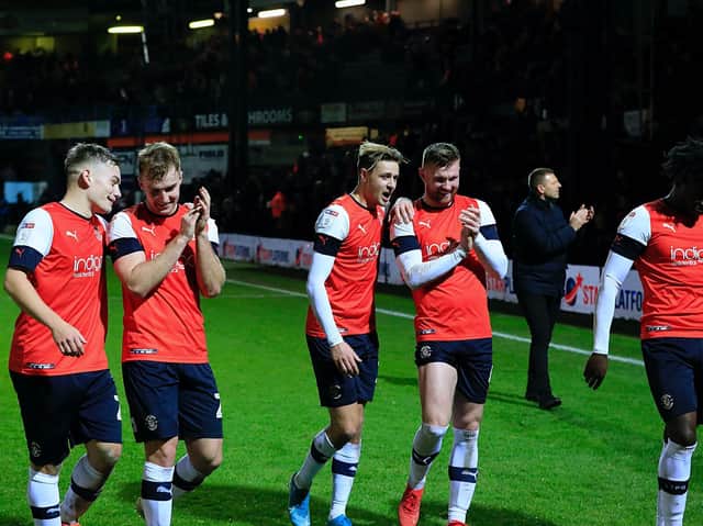 Town's players celebrate their 2-1 win over Wigan