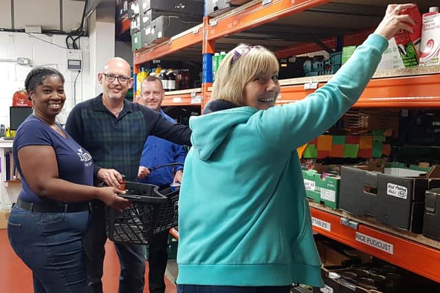 Staff at The Mall volunteer to help at Luton Foodbank