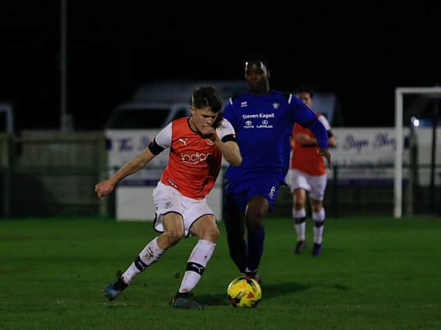 Sam Beckwith in action for the Hatters' development team recently