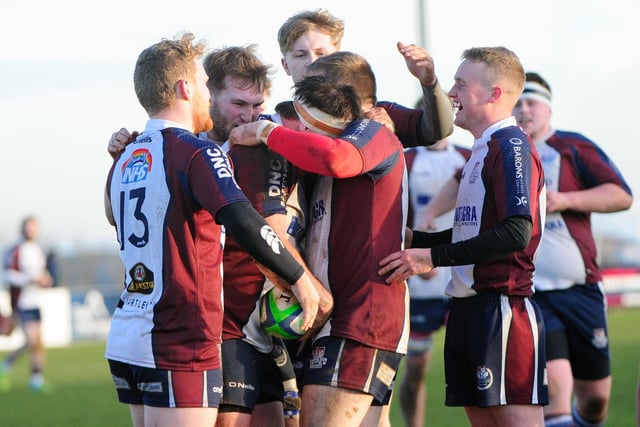Sam Dawson is congratulated for scoring his side's third try in the 37-7 win for Scarborough RUFC against derby rivals Pocklington