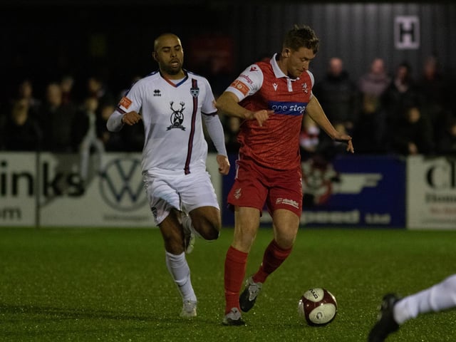Boro defender Ash Jackson is tracked by Whitby Town striker Jacob Hazel