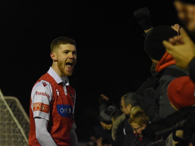 Kieran Glynn shares his delight with the Boro crowd after setting up the winner against Whitby Town