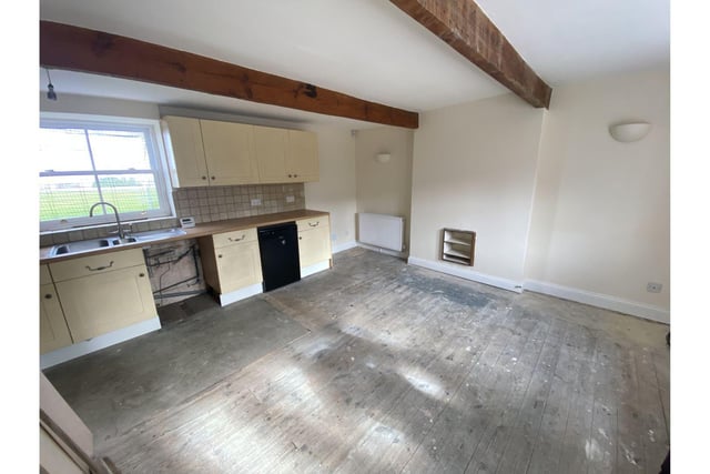The small cottage has one open plan living space with the kitchin, dining and lounge in the one room.