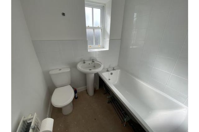 The bathroom is a good size with plenty of room for modernisation.