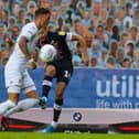 Harry Cornick curls Luton in front at Leeds this evening