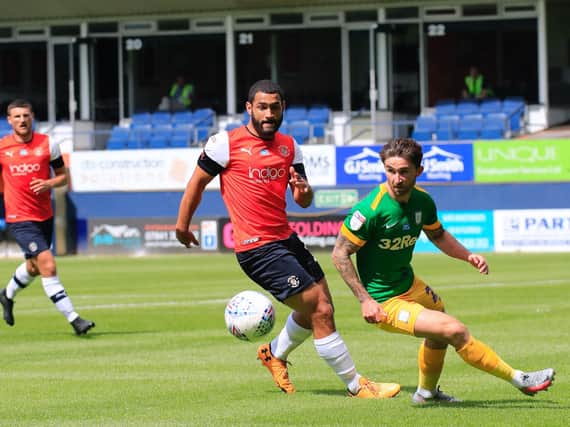 Defender Cameron Carter-Vickers has extended his stay with Luton
