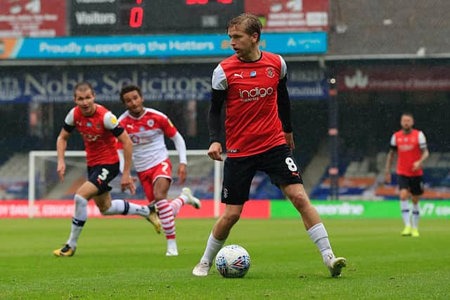 Luke Berry looks for a pass against Barnsley on Tuesday night