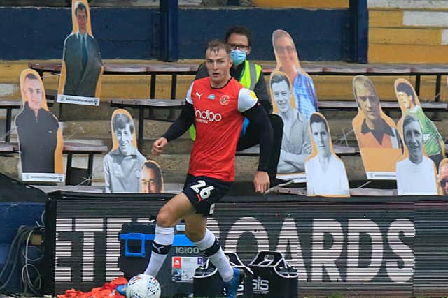 Town full back James Bree goes forward against former club Barnsley