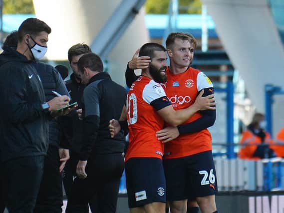 Elliot Lee celebrates with James Bree after making it 2-0 to Luton on Friday night