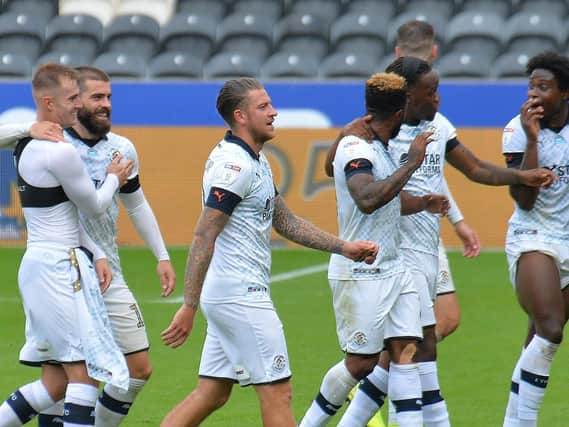 Town's players enjoy their 1-0 win at Hull this afternoon