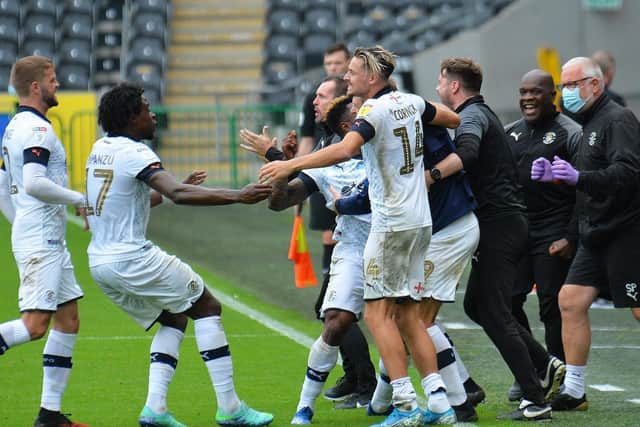 Luton celebrate their 1-0 win at Hull City on Saturday