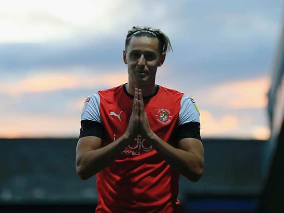 Harry Cornick prays for the Hatters to stay up last night