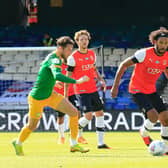Izzy Brown gets on the ball for the Hatters during his time at Kenilworth Road