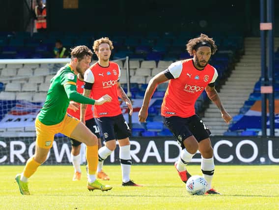 Izzy Brown gets on the ball for the Hatters during his time at Kenilworth Road