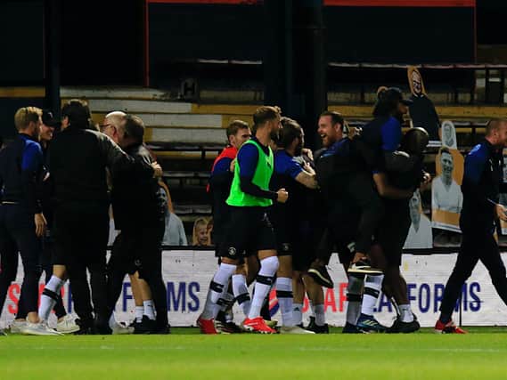 Luton Town celebrate staying in the Championship on Wednesday night