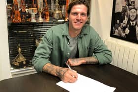 Glen Rea signs his new Luton contract