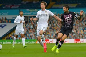 Sonny Bradley takes on Leeds United attacker Patrick Bamford in the Hatters' 1-1 draw at Elland Road