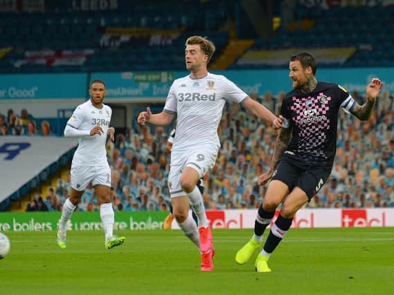 Sonny Bradley takes on Leeds United attacker Patrick Bamford in the Hatters' 1-1 draw at Elland Road
