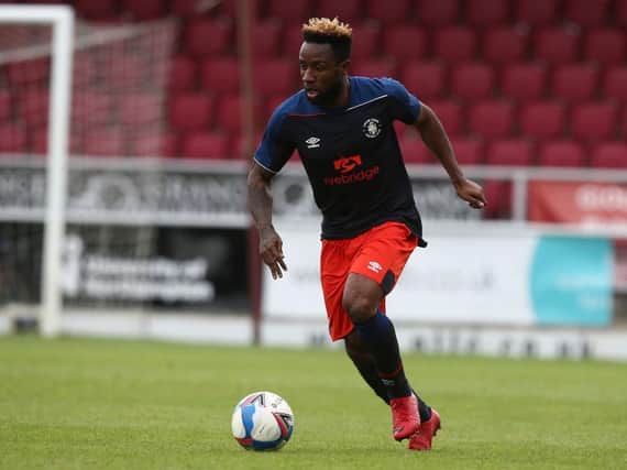 Kazenga LuaLua on the ball during Town's 3-0 win at Northampton on Saturday