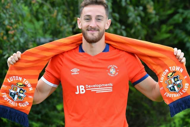 Tom Lockyer has agreed to join Luton after leaving Charlton