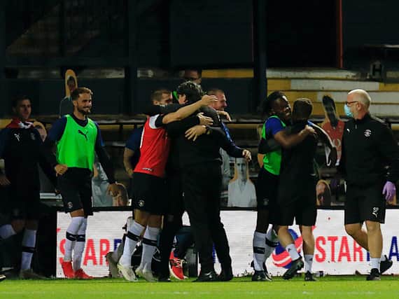 Luton celebrate staying up on the final day of last season
