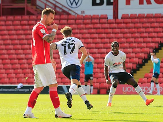 James Collins wheels away after scoring the winner at Barnsley on Saturday