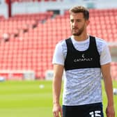 Luton defender Tom Lockyer warms up before Town's 1-0 win at Barnsley on Saturday