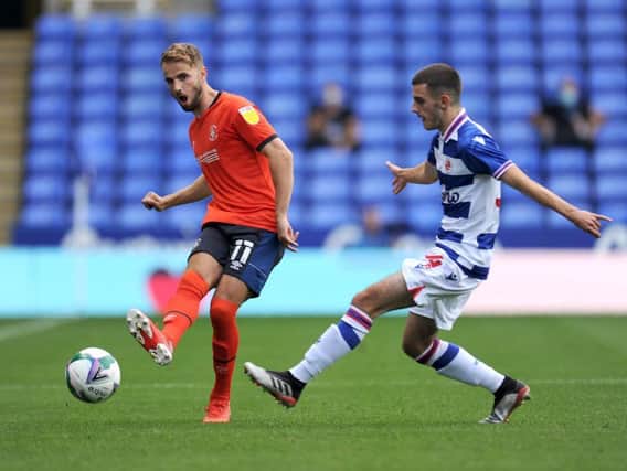 Andrew Shinnie plays the ball down the line for Luton in their 1-0 win at Reading this evening