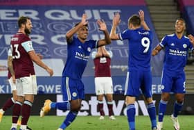 James Justin celebrates scoring his first Premier League goal for Leicester with team-mate Jamie Vardy