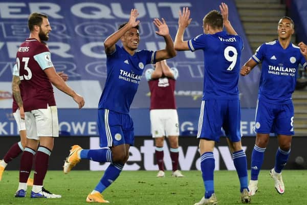 James Justin celebrates scoring his first Premier League goal for Leicester with team-mate Jamie Vardy