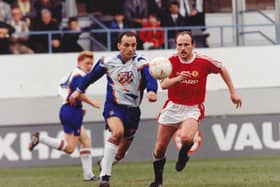 Imre Varadi races away from Mike Phelan during Luton's 1-1 draw with Manchester United in April 1992